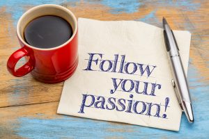 Follow your passion! Advice or reminder - handwriting on a napkin with a cup of coffee